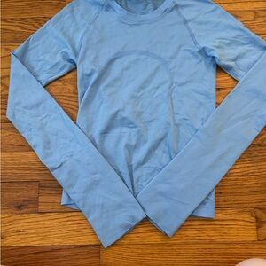 Lululemon blue long sleeve size 0 never worn